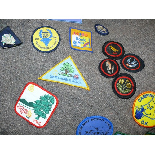 336 - Girl guides felt poncho blanket covered in 1980's guide patches, including a Trefoil Guild ribbon dr... 