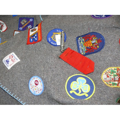 336 - Girl guides felt poncho blanket covered in 1980's guide patches, including a Trefoil Guild ribbon dr... 