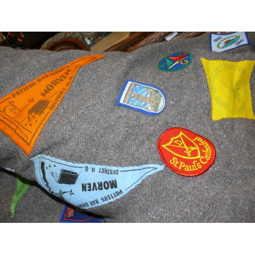 336 - Girl guides felt poncho blanket covered in 1980's guide patches, including a Trefoil Guild ribbon dr... 