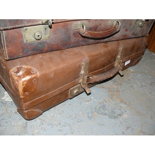 338 - Pair vintage brown leather suitcases.
1x Revelation vulcanized fibre & 1x Antique brown leather with... 