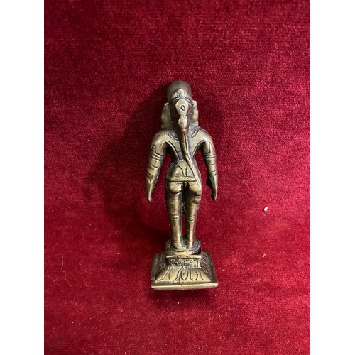 83 - Indian/Tibetan brass deity or devotional temple statue. 12cm tall.