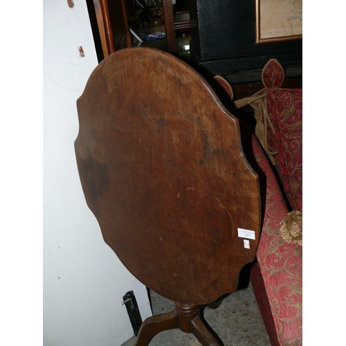 457 - Victorian mahogany tilt top wine/occasional side table with three feet and a ring turned column.