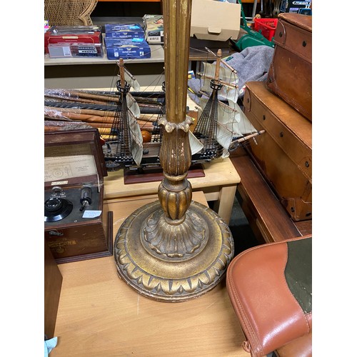 107 - Early 20thC gold pine column floor lamp, carved with acanthus details and a fluted stem, with a melt... 