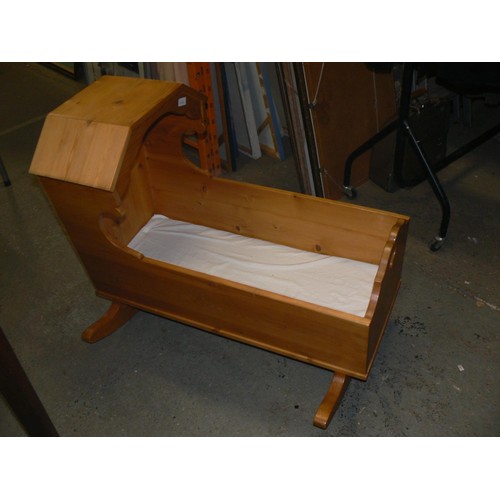 413C - A handmade traditional baby’s cradle in pine with rockers