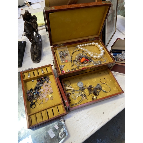 95B - Chinese hardwood jewellery box with costume jewellery contents. Brass strapwork and fittings with tw... 