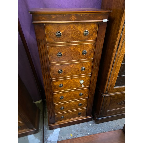 476 - Modern dark walnut veneered incognito gun cabinet in the form of a tallboy chest of drawers.