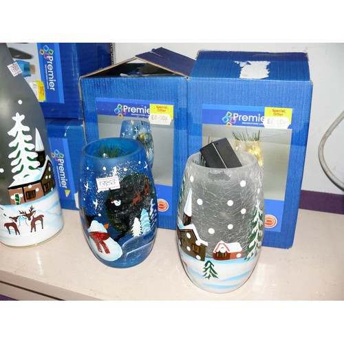 74 - 2 LIGHT UP CHRISTMAS VASES 1 WITH SNOWMAN AND I WITH HOUSE DECORATION PLUS 2 MATCHING BOTTLES