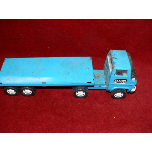 87 - A METAL MODEL OF A FLATBED TRUCK BY LOUIS MARX