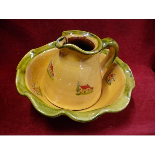 333 - Earthenware scalloped rim wash bowl and jug, decorated with mustard & green glaze and pictorial cott... 