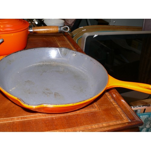 355 - 2 LE CRUESET SAUCEPANS AND A FRYING PAN IN FLAME ORANGE, ALL IN VERY GOOD CONDITION