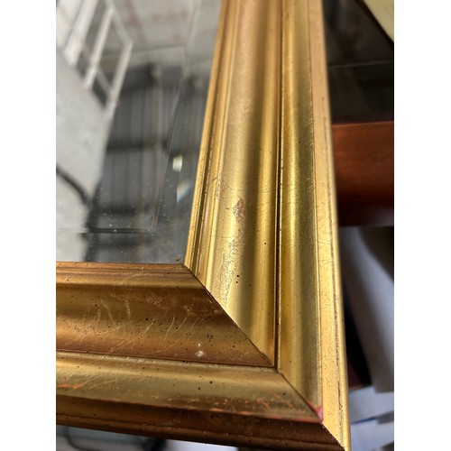 415 - A GOOD QUALITY GILT FRAMED BEVEL EDGED MIRROR 28