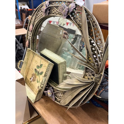 282 - DECORATIVE METAL WALL MIRROR WITH FLORAL DESIGN AND A METAL TRAY