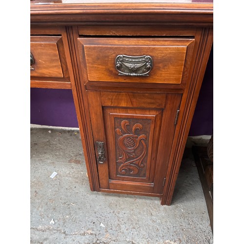 370 - VINTAGE WALNUT PEDASTAL DESK WITH CARVED PANELS