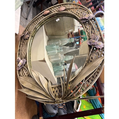 282 - DECORATIVE METAL WALL MIRROR WITH FLORAL DESIGN AND A METAL TRAY