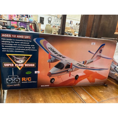 508 - RADIO CONTROL SUPER PLANE APPEARS NEW IN BOX AND A BAG OF NEW TOYS