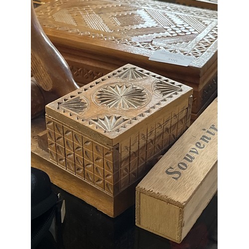 396 - CARVED WOODEN CIGARETTE BOXES AND A VINTAGE TABLE LIGHTER