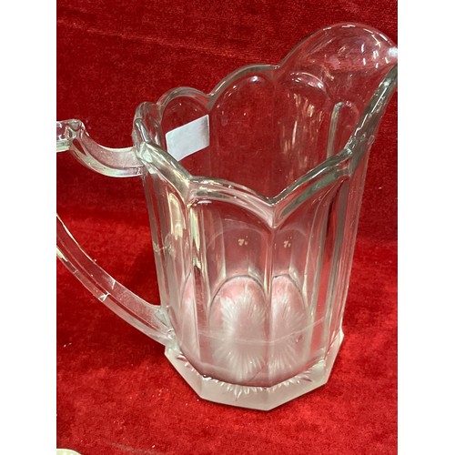 36 - A LARGE GLASS WATER JUG A SILVER SPOON A SILVER CAKE SLICE, SILVER/P FISH SERVER