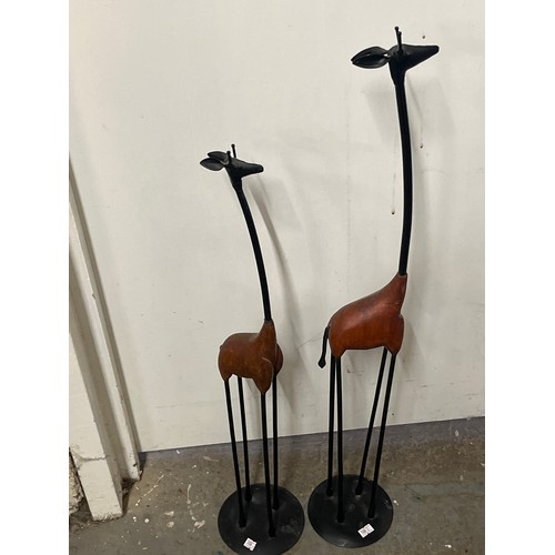 73 - A PAIR OF TALL CONTEMPORARY GIRAFFE SCULPTURES IN WOOD AND METAL