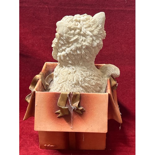 76 - LARGE FIGURE OF A WESTIE DOG CLIMBING OUT OF GIFT BOX