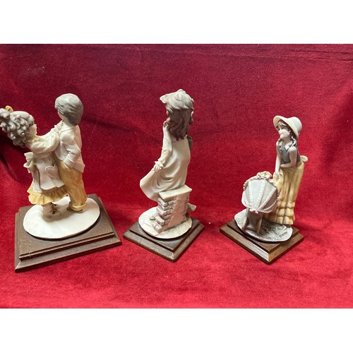 78 - 3 FIGURINES OF CHILDREN IN ANTIQUE STYLE