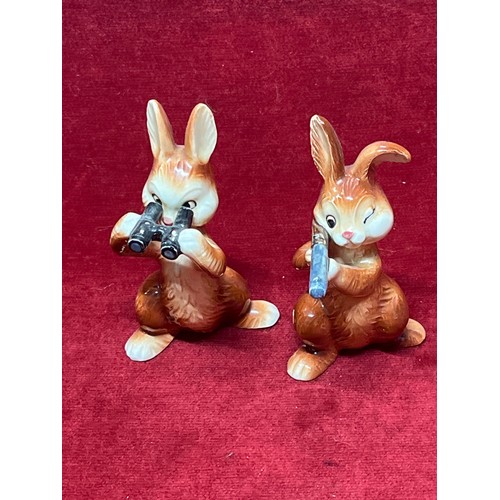 81 - A PAIR OF GOEBEL RABBIT FIGURINES ONE WITH RIFLE AND ONE WITH BINOCULARS