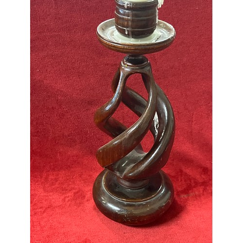 91 - A LOVELY HAND CARVED FROM A SOLID PIECE OF WOOD  CANDLE HOLDER IN SPIRAL DESIGN PLUS A CANDLE