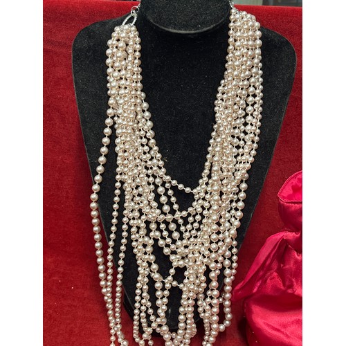 36 - PEARL HEAVEN 14 STRINGS OF PEARLS ON ONE NECKLACE WITH ITS OWN BAG