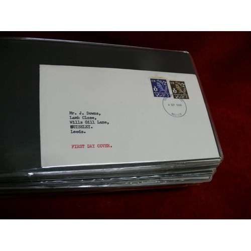 65 - ALBUM CONTAINING 60 DIFFERENT 1ST DAY COVERS 1948-2004