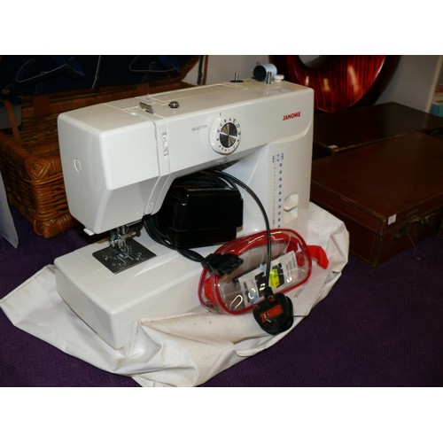 92 - JANOME MODEL 1550 SEWING MACHINE WITH FOOT PEDAL AND MANUAL, PERFECT WORKING ORDER