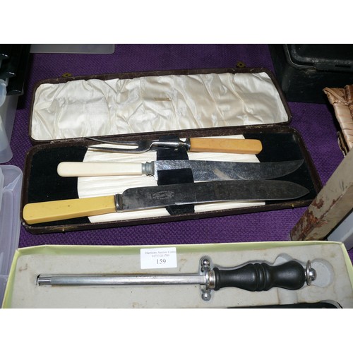 159 - VINTAGE STAINLESS STEEL CARVING SETS 1 IN VINTAGE FITTED CASE AND 1 IN ORIGINAL BOX