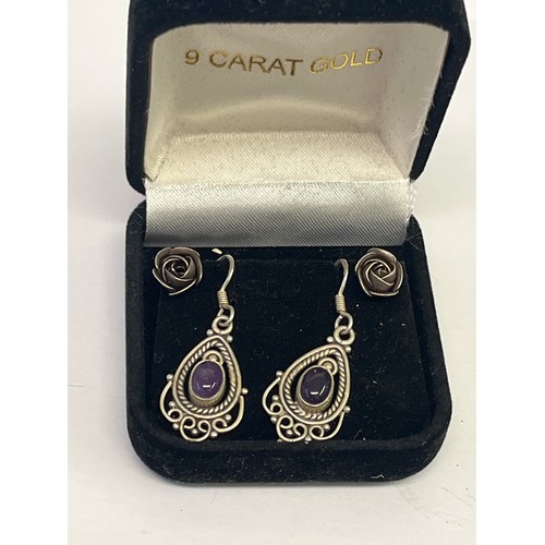 25 - 2 PAIRS OF SILVER EARRINGS 1 WITH AMETHYST DROPS PLUS A PAIR IN ROSE PATTERN