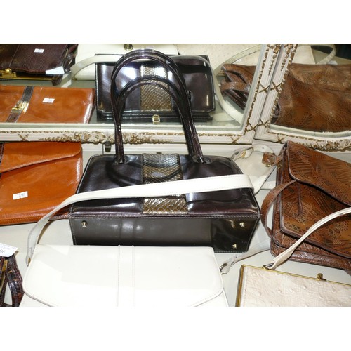 296 - 7 VINTAGE LEATHER HANDBAGS IN VARIOUS DESIGNS AND STYLES