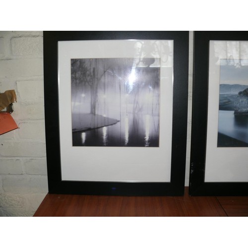 141B - A PAIR OF CONTEMPORARY BLACK & WHITE PHOTOS IN BLACK FRAMES