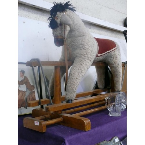 116 - CHILDS ROCKING HORSE ON A STURDY ROCKING FRAME, A LITTLE TLC NEEDED ON THE TAIL.