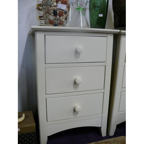 121 - PAIR OF CREAM 3 DRAWER BEDSIDE CHESTS, NEW