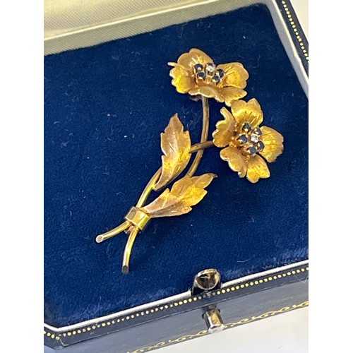 11 - A 18ct GOLD BROOCH WITH DIAMONDS AND SAPPHIRES WEIGHT IS 8.92gr BOXED