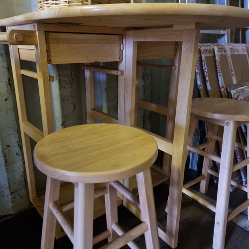 471 - KITCHEN ISLAND STYLE TABLE WITH TWO STOOL THAT TUCK UNDER, ON WHEELS