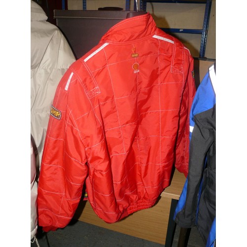 300 - FERRARI F1 WORLD CHAMPIONSHIP TEAM JACKET IN RED AND A RUKKA GORE-TEX MOTORBIKE JACKET SIZE 54