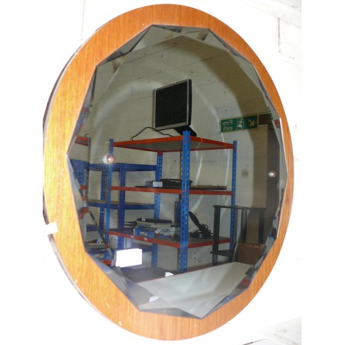 335A - A DODECAGON MIRROR ON A CIRCULAR TEAK EFFECT FRAME