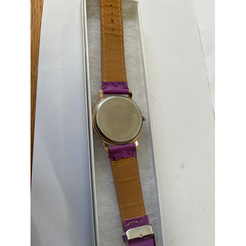 26 - LADIES PURPLE WATCH WITH SHOE DESIGN