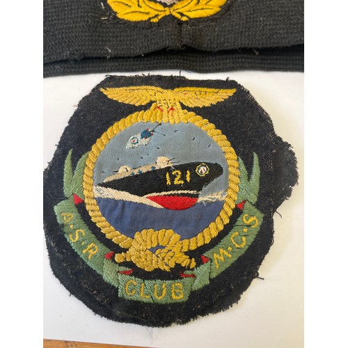 40 - AIR SEA RESCUE AND MARINE CRAFT SECTION CLOTH BADGE AND A ROYAL NAVY CAP BADGE AND BAND