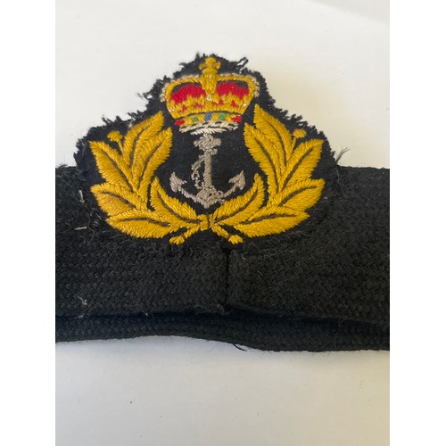 40 - AIR SEA RESCUE AND MARINE CRAFT SECTION CLOTH BADGE AND A ROYAL NAVY CAP BADGE AND BAND