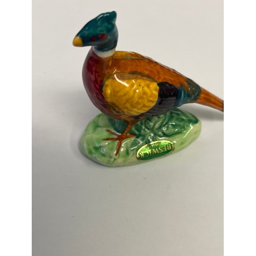 51 - SMALL BESWICK PHEASANT FIGURINE AND A PORCELAIN PELICAN WALL PLAQUE