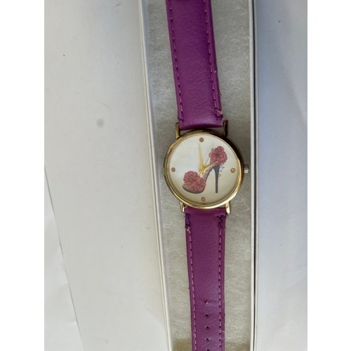 26 - LADIES PURPLE WATCH WITH SHOE DESIGN