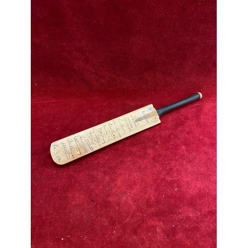 86 - Miniature Nicolls Crusader cricket bat with facsimile signatures from the England first test 1953 te... 