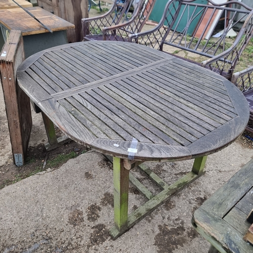 503 - LARGE WOODEN OVAL GARDEN TABLE