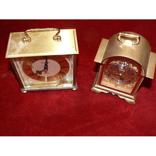 95 - 2 QUARTZ CARRIAGE STYLE CLOCKS TIMEMASTER AND RHYTHM