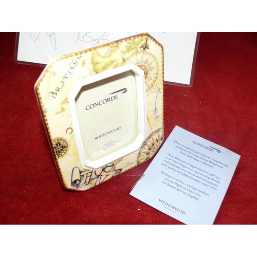 65 - A WEDGWOOD CONCORDE PHOTOGRAPH FRAME (BOXED)WITH A CERTIFICATE OF PRESENTATION FROM THE CONCORDE FLI... 