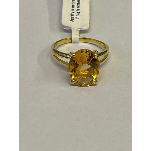 26 - A SOLID SILVER RING WITH A LARGE CITRINE STONE SIZE V NEW WITH TAG