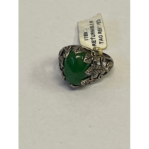 28 - A SOLID SILVER RING WITH LARGE GREEN STONE SIZE Q NEW WITH TAG